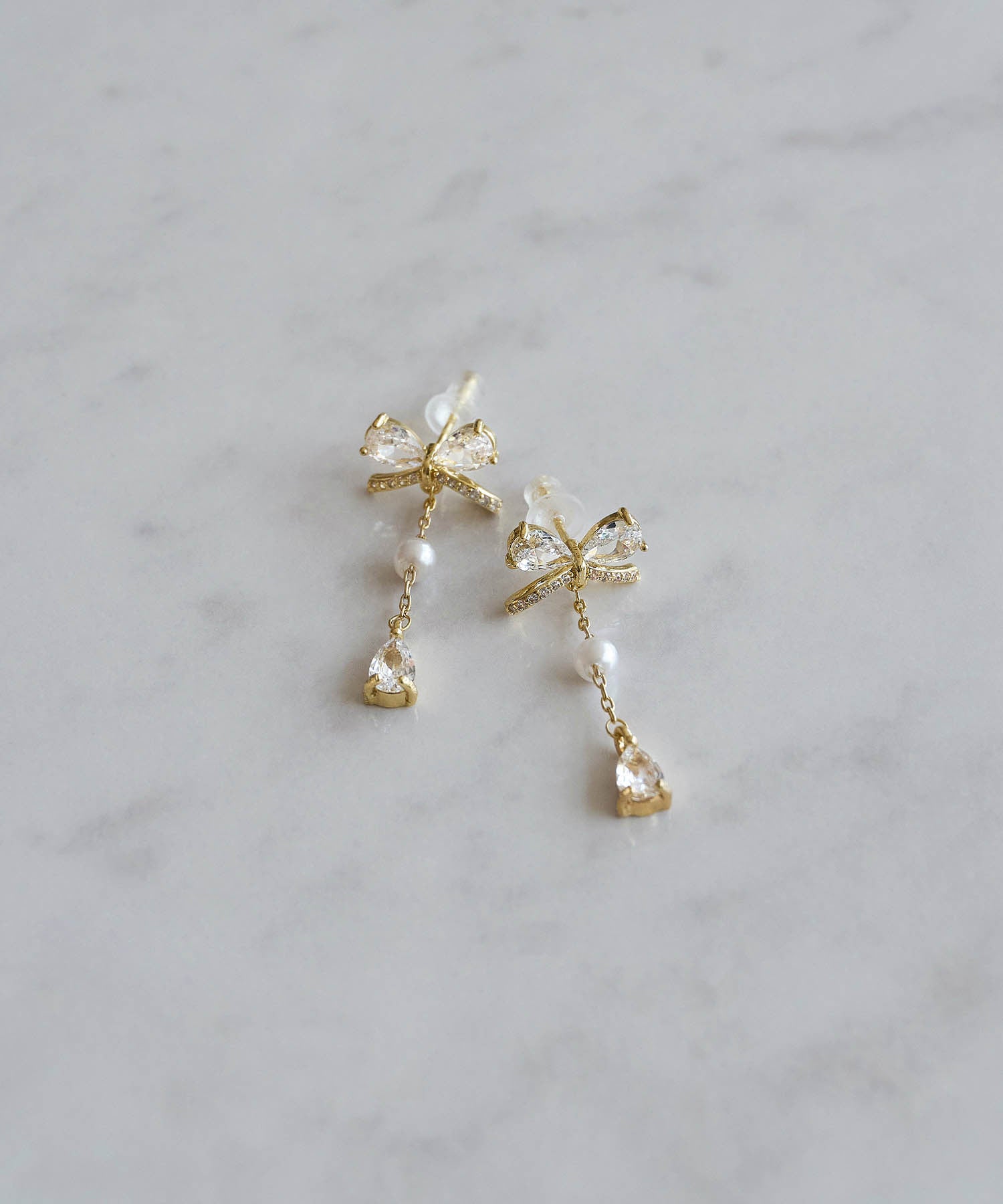 【COMING SOON】ビジューリボンパールスイングピアス