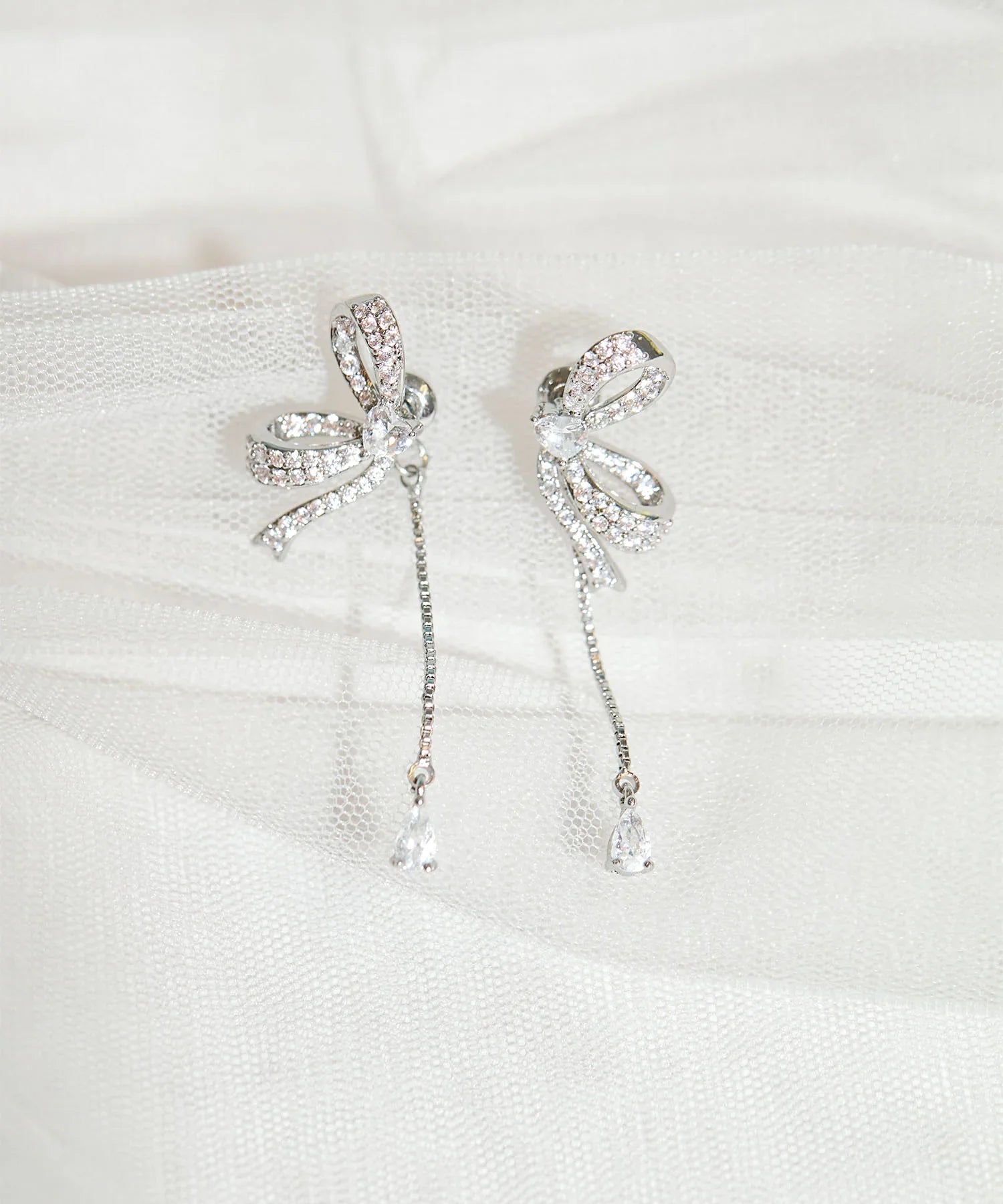 【当日発送】シルバービジューリボンピアス