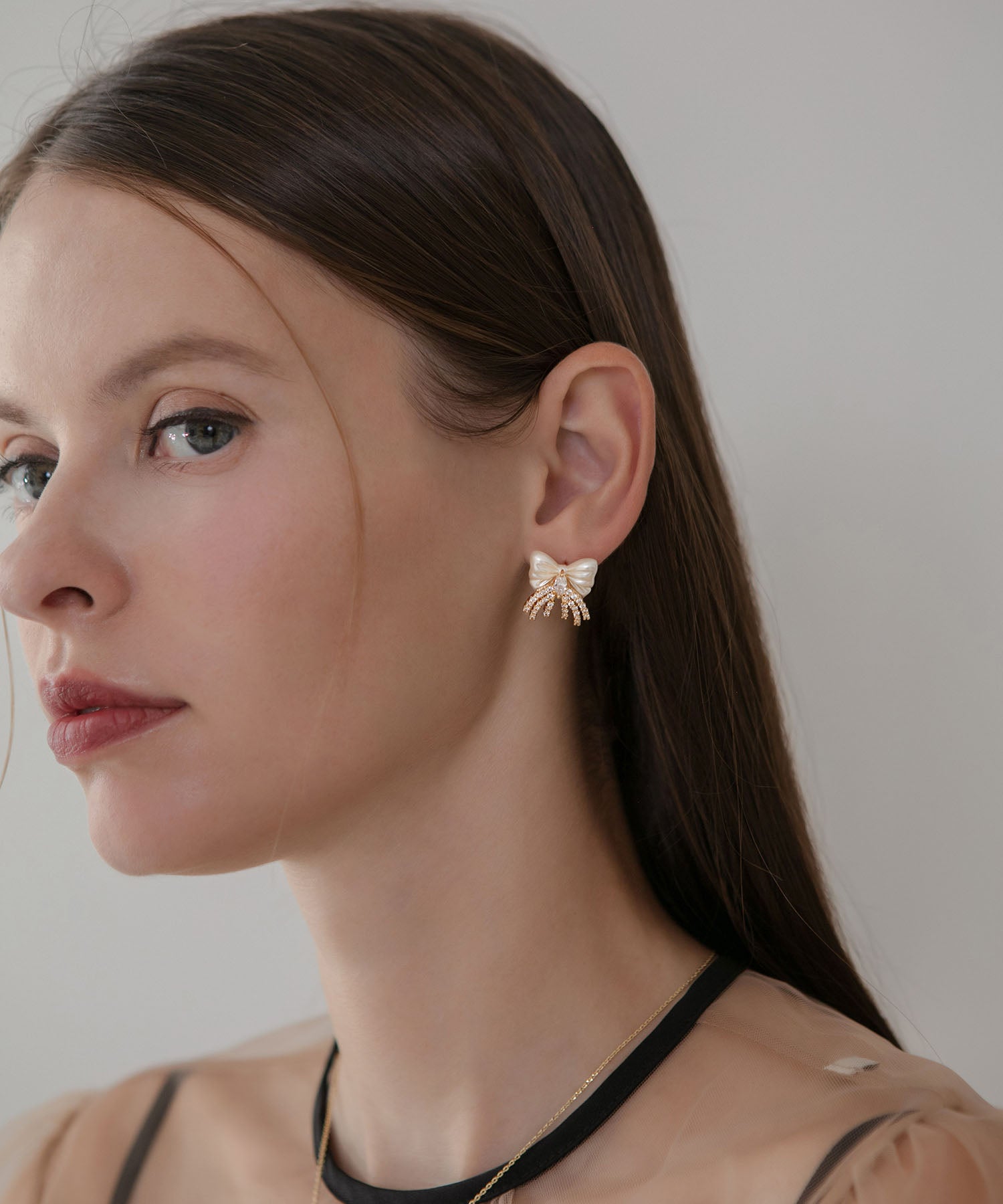 【当日発送】パールリボンモチーフストーンフリンジピアス