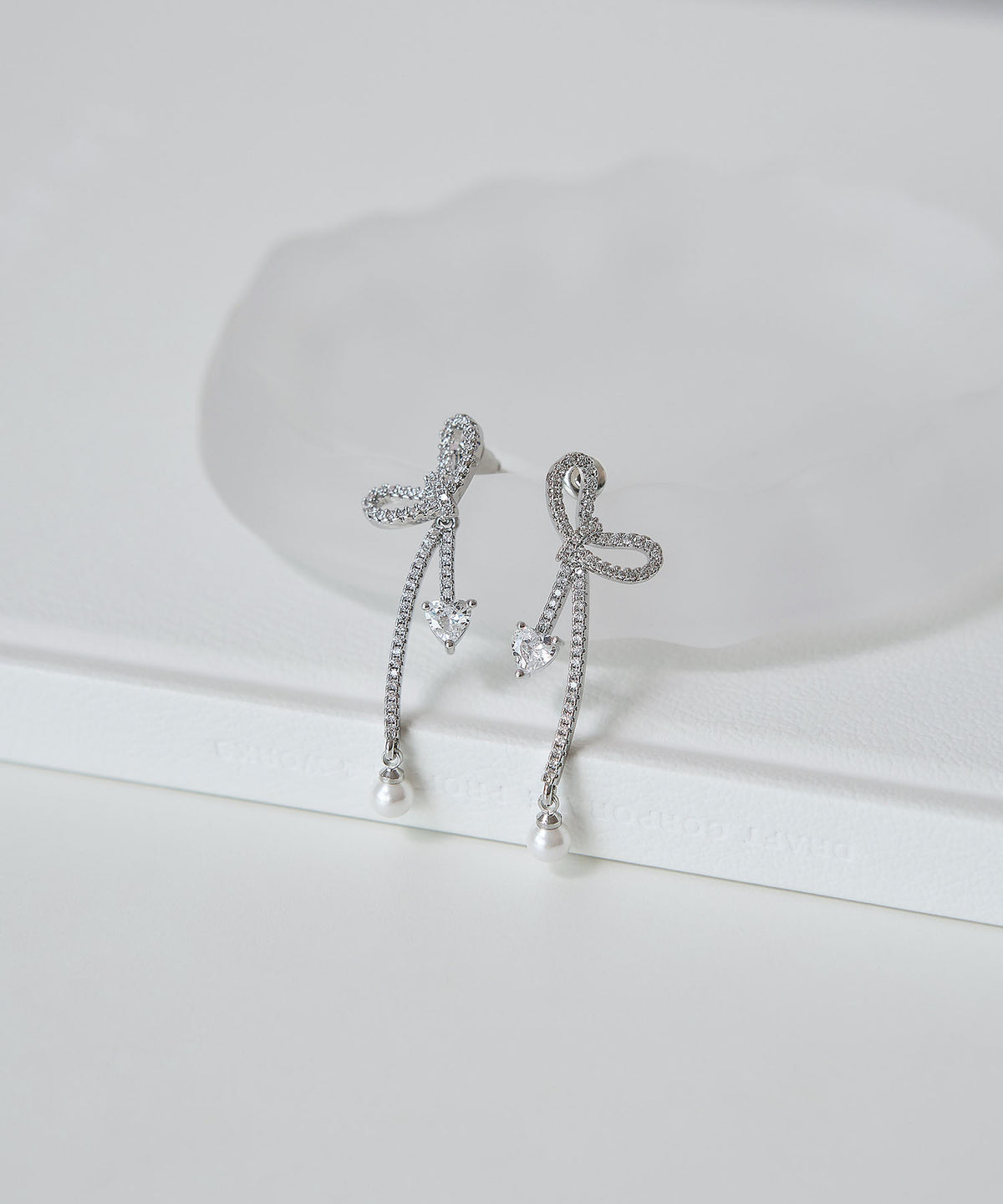 【COMING SOON】パヴェリボンハートビジューパールスウィングピアス